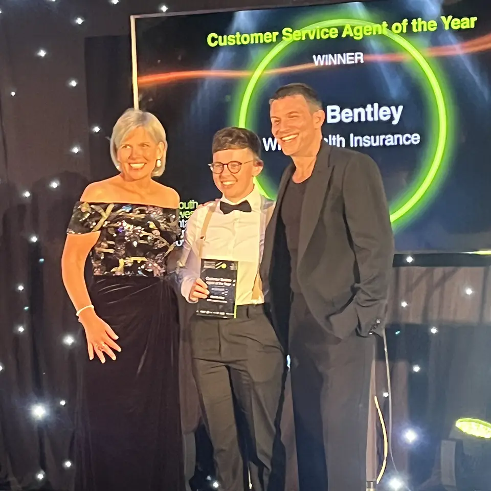 Ellie Bentley accepting Customer Service Agent of the Year award